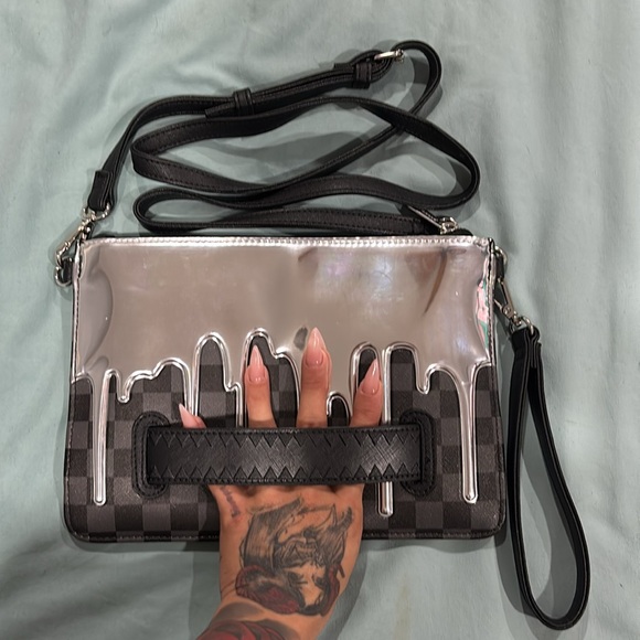 Soldout NWOT Sprayground Ghost Drip Crossover Clutch - Picture 2 of 3